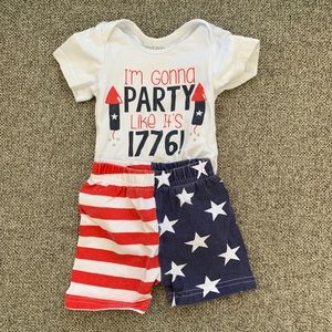 Festive baby onesie with matching shorts.